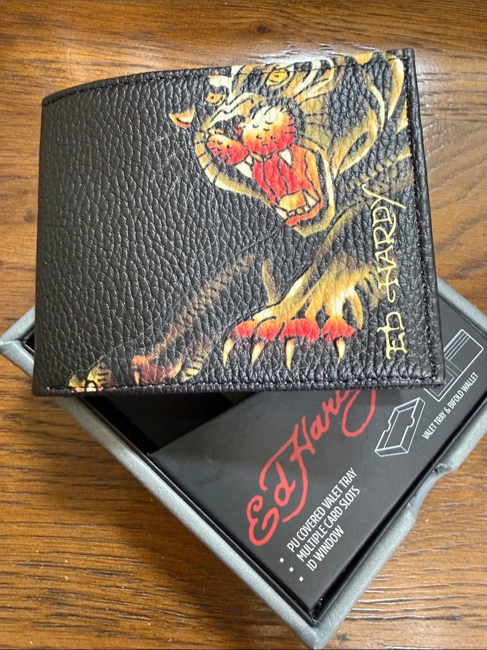 Ed Hardy Black Wallet with Fierce Tiger Artwork. Multiple card slots. ID window.